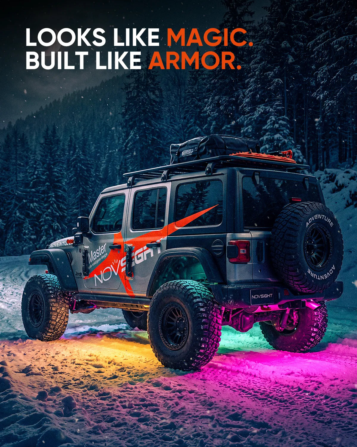 MagicCarpet RGB underglow kit lighting the snow under a Jeep Wrangler JL at night